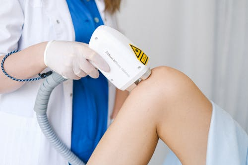 Laser hair removal treatment being performed on a client using advanced laser technology at a Waterloo clinic