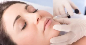 A woman getting a lip filler in Waterloo